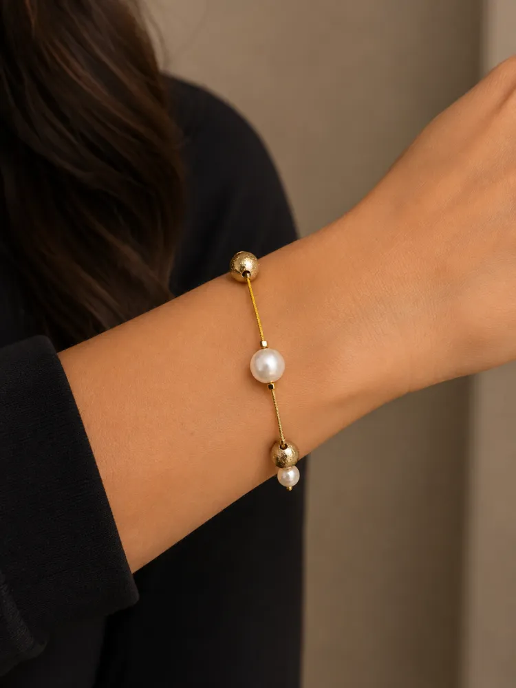 Pulseira de Perola com Bolinha Dourada