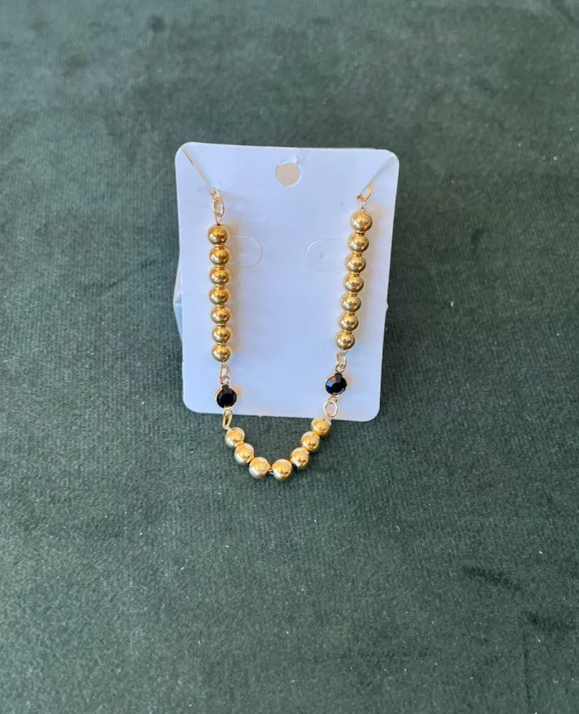 Pulseira de Bolinhas Dourada com Bola Preta